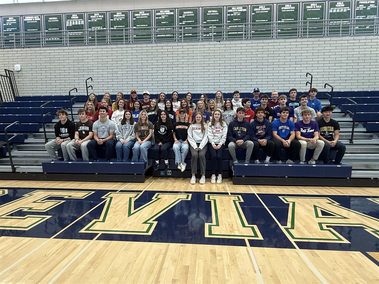 Thirty-seven New Trier athletes commit to college sports